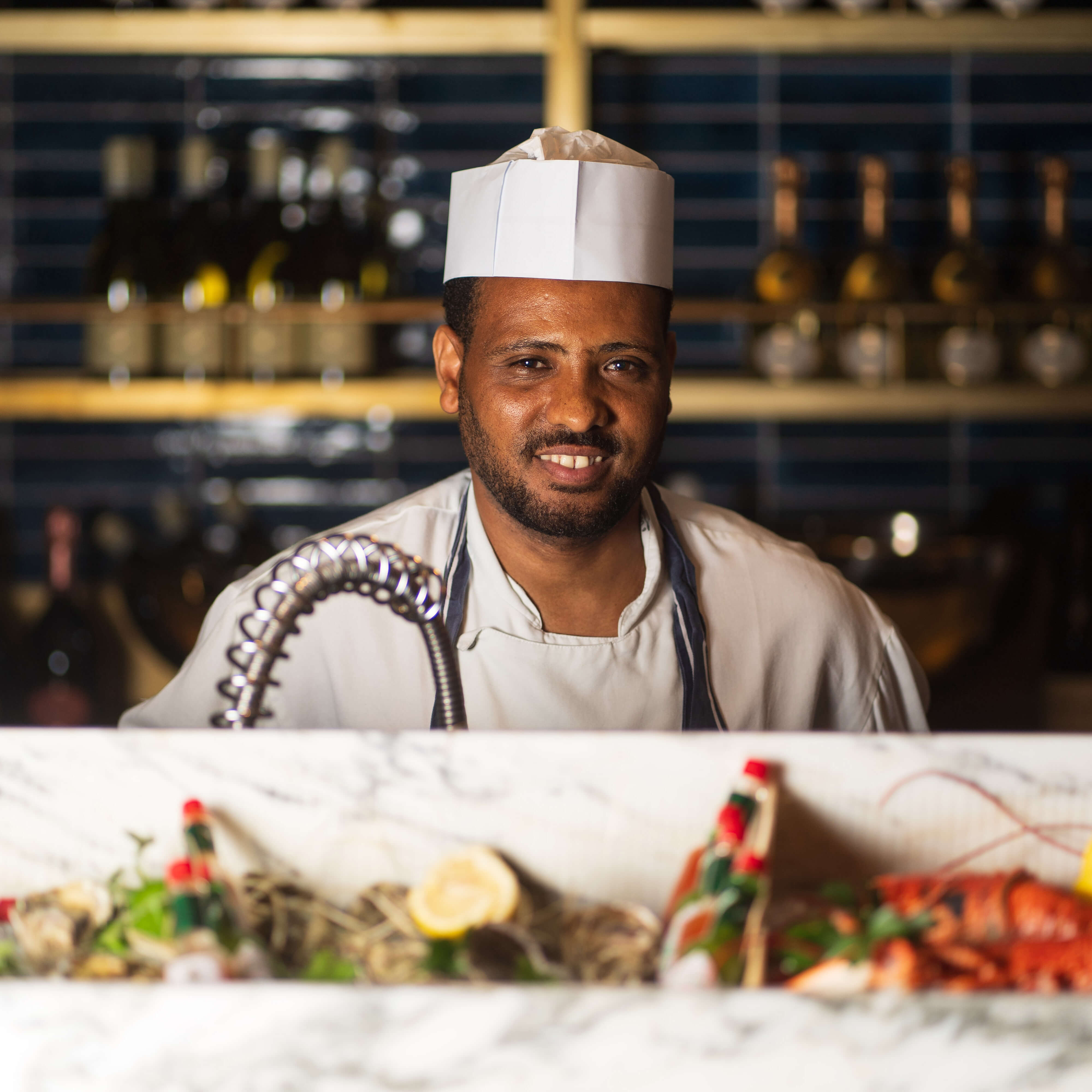 A FishWorks chef smiling
